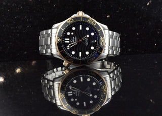 Omega Seamaster Diver 300M Master Co Axial Stahl Roségold Black Dial Full Set unpoliert